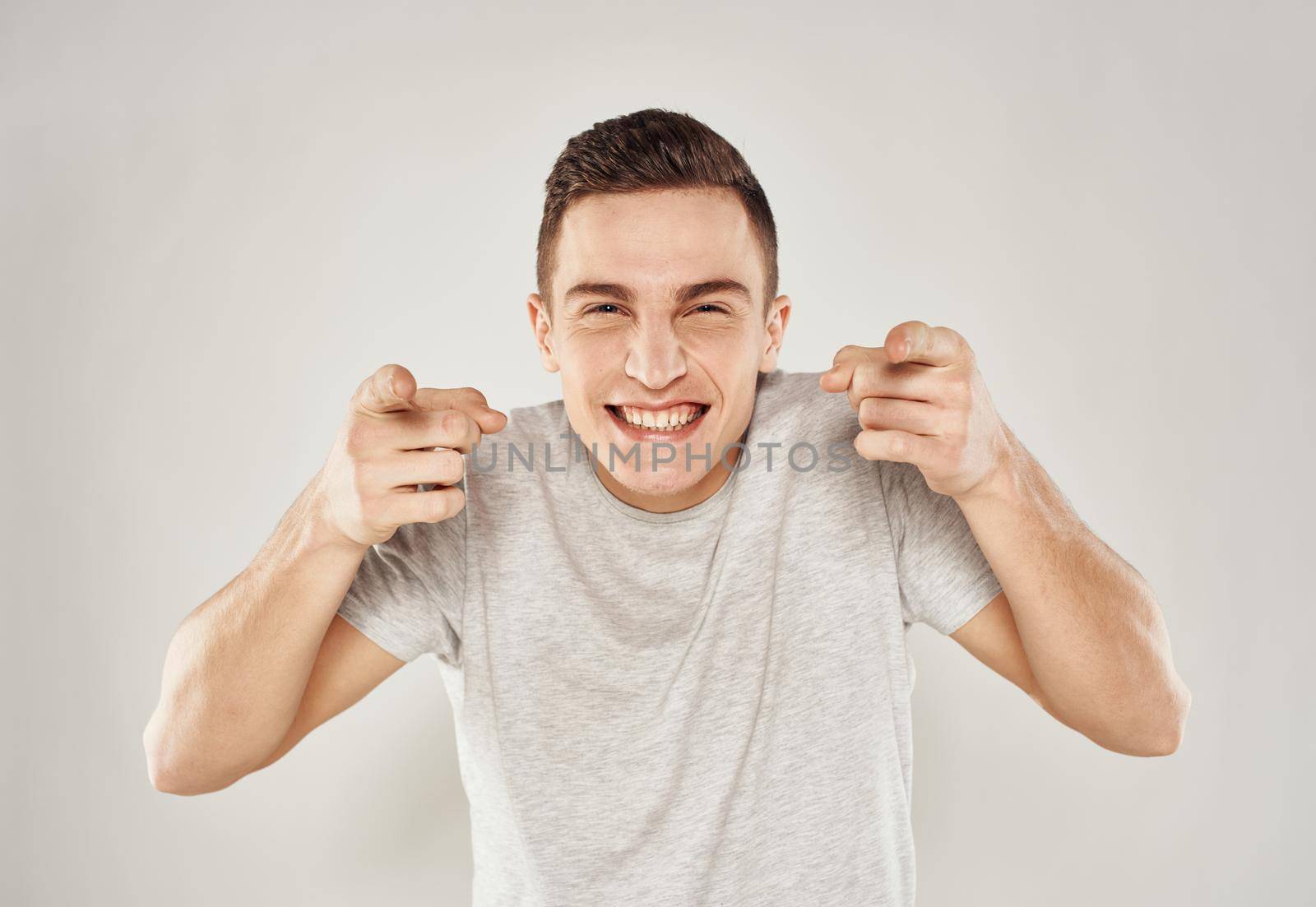 Cheerful man emotions gestures hands joy close-up. High quality photo