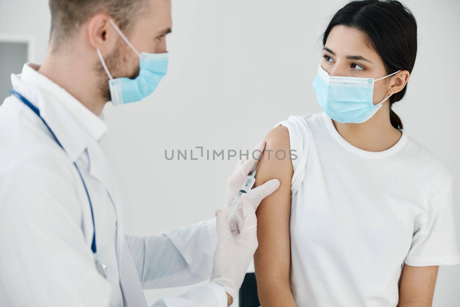 doctor syringe Temryuk protective gloves close-up vaccination by SHOTPRIME