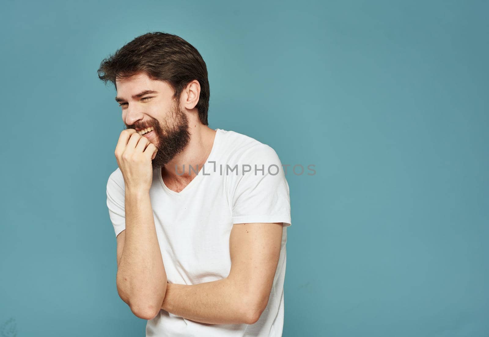 Emotional man gestures with his hands surprise shock model. High quality photo