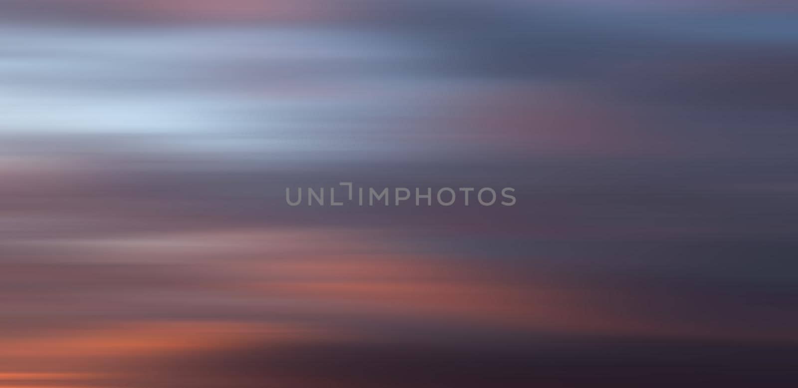 Abstract blurred nature background. Clouds in motion blur. Background for design and templates