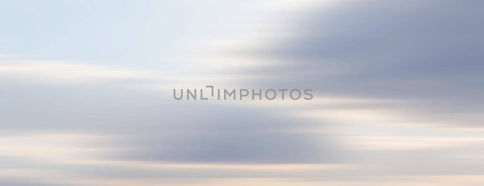 Abstract blurred nature background. Clouds in motion blur. Background for design and templates