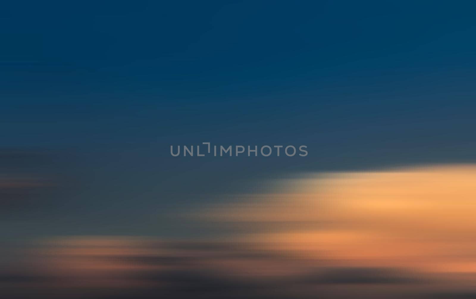 Abstract blurred nature background. Clouds in motion blur. Background for design and templates