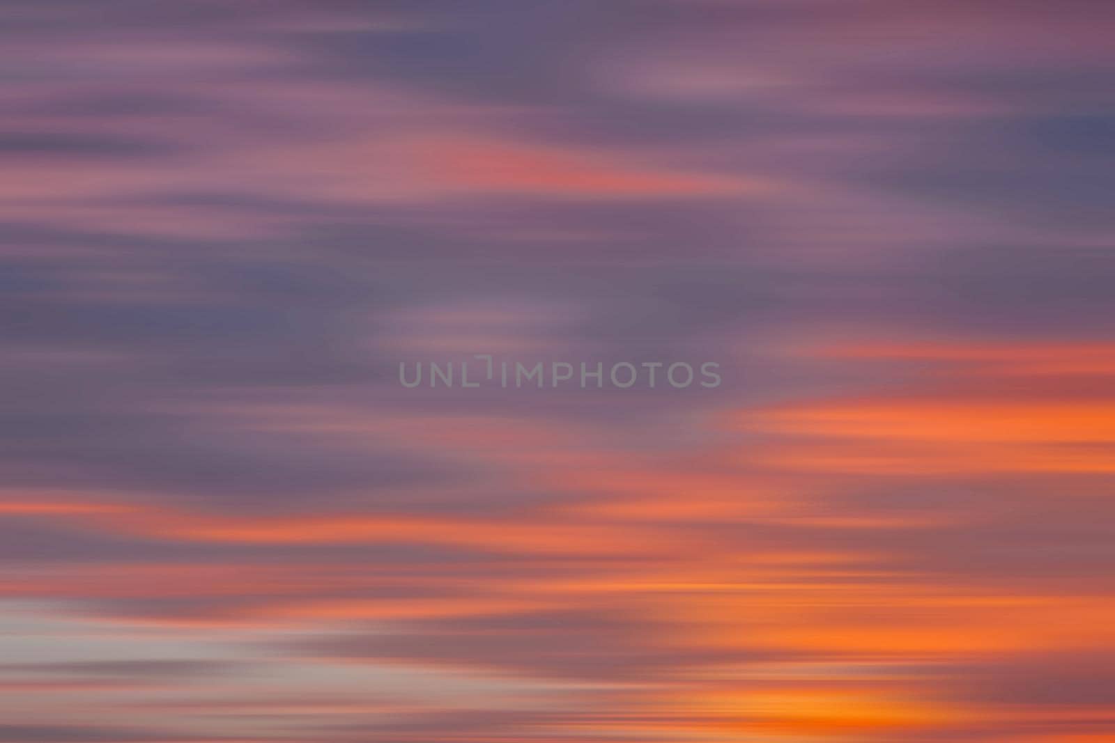 Abstract blurred nature background. Clouds in motion blur. Background for design and templates