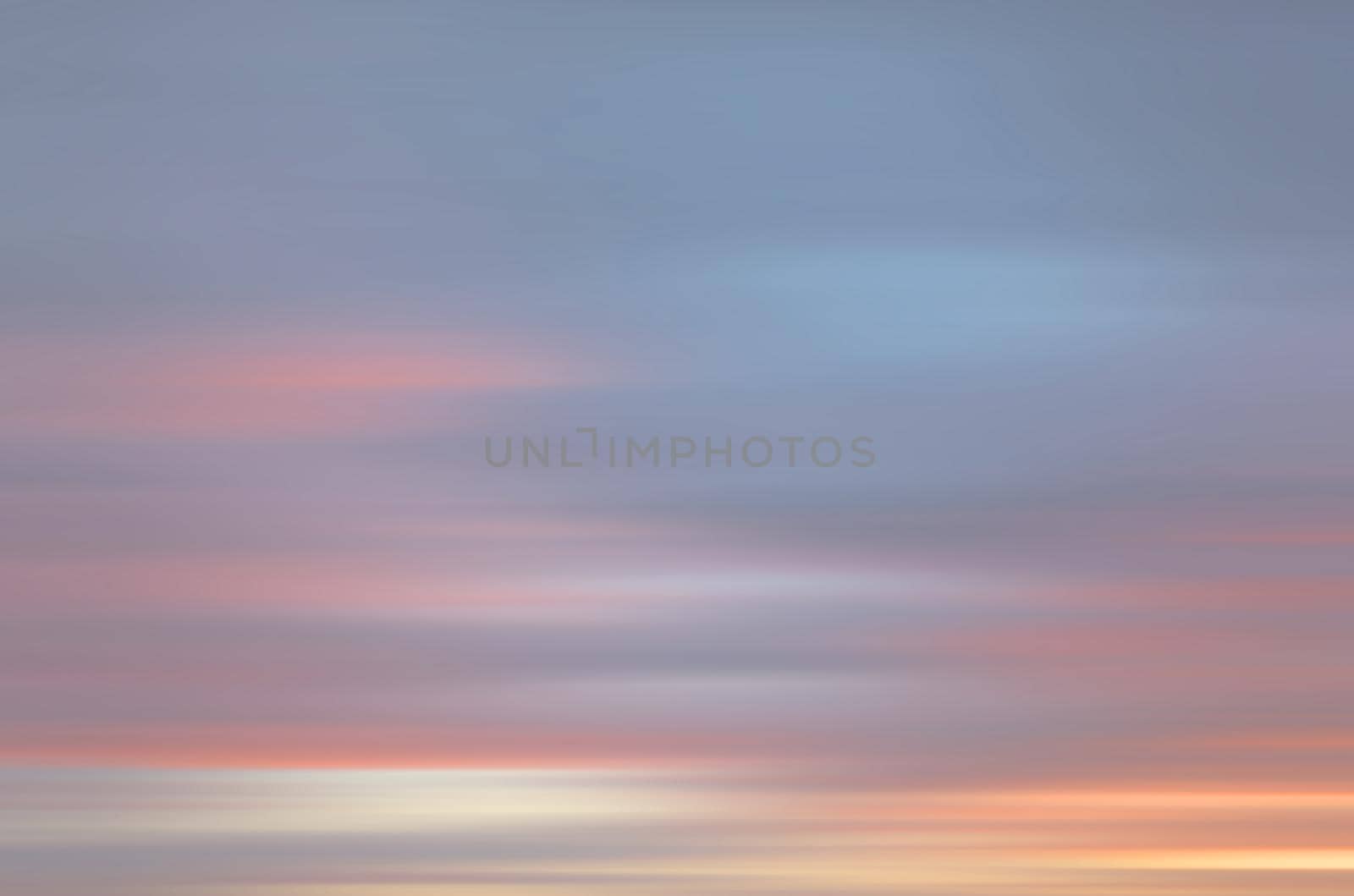 Abstract blurred nature background. Clouds in motion blur. Background for design and templates
