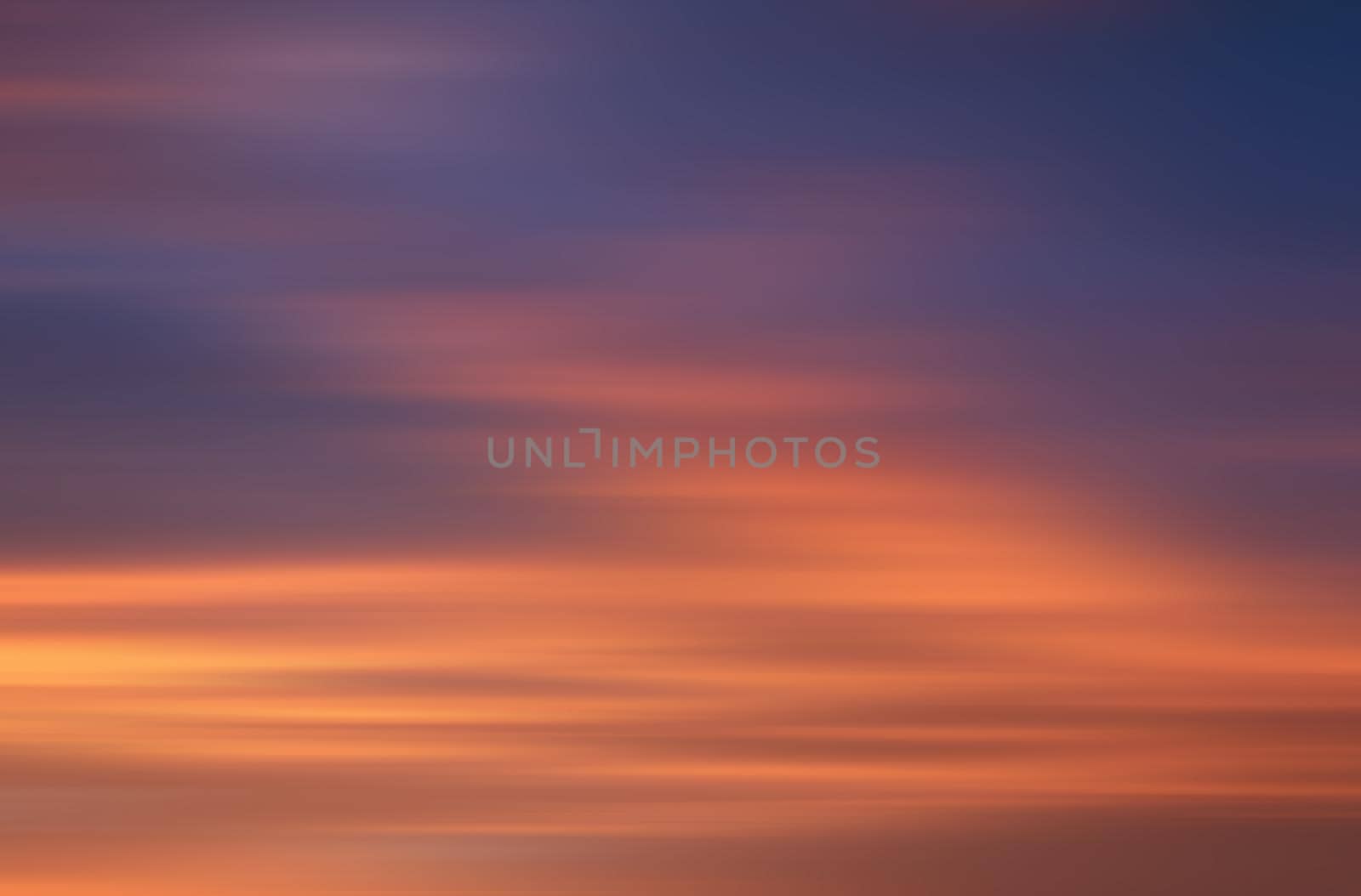 Abstract blurred nature background. Clouds in motion blur. Background for design and templates