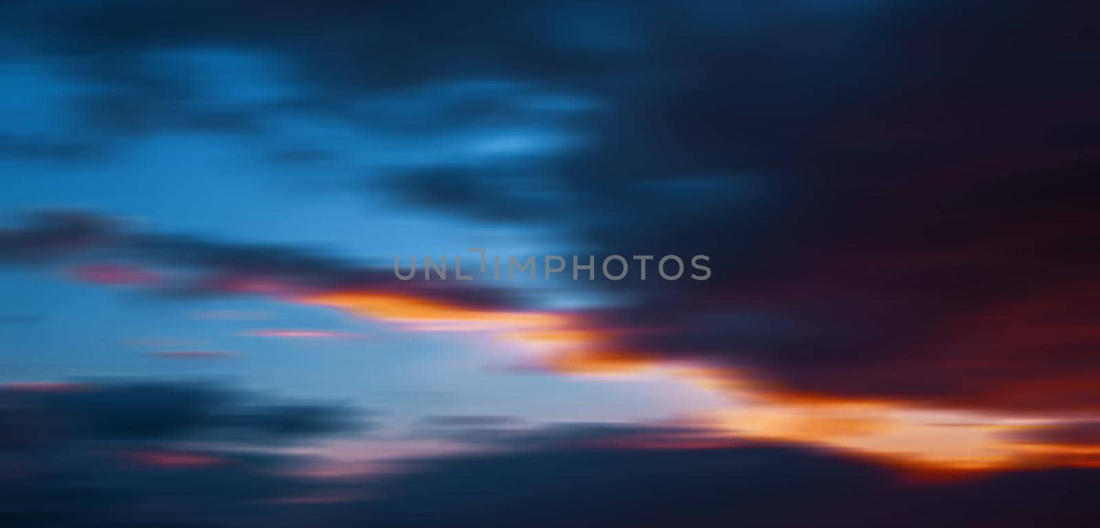 Abstract blurred nature background. Sky with dramatic clouds