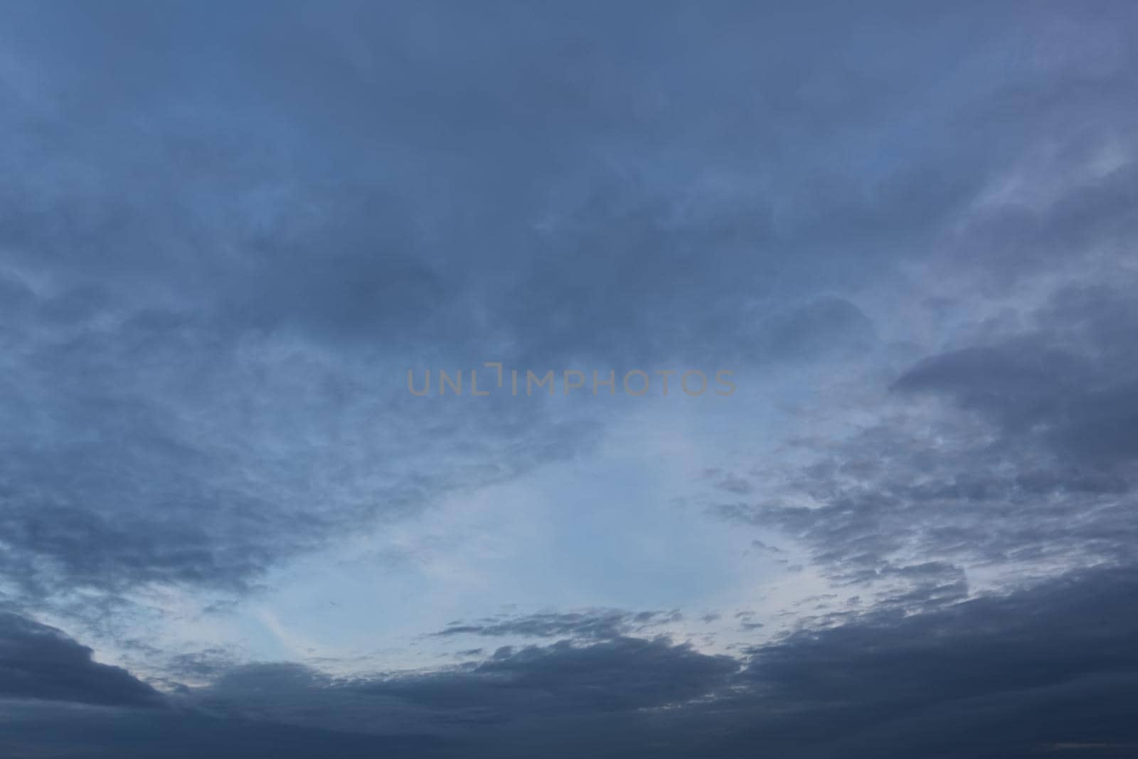 Evening sky with clouds and moon