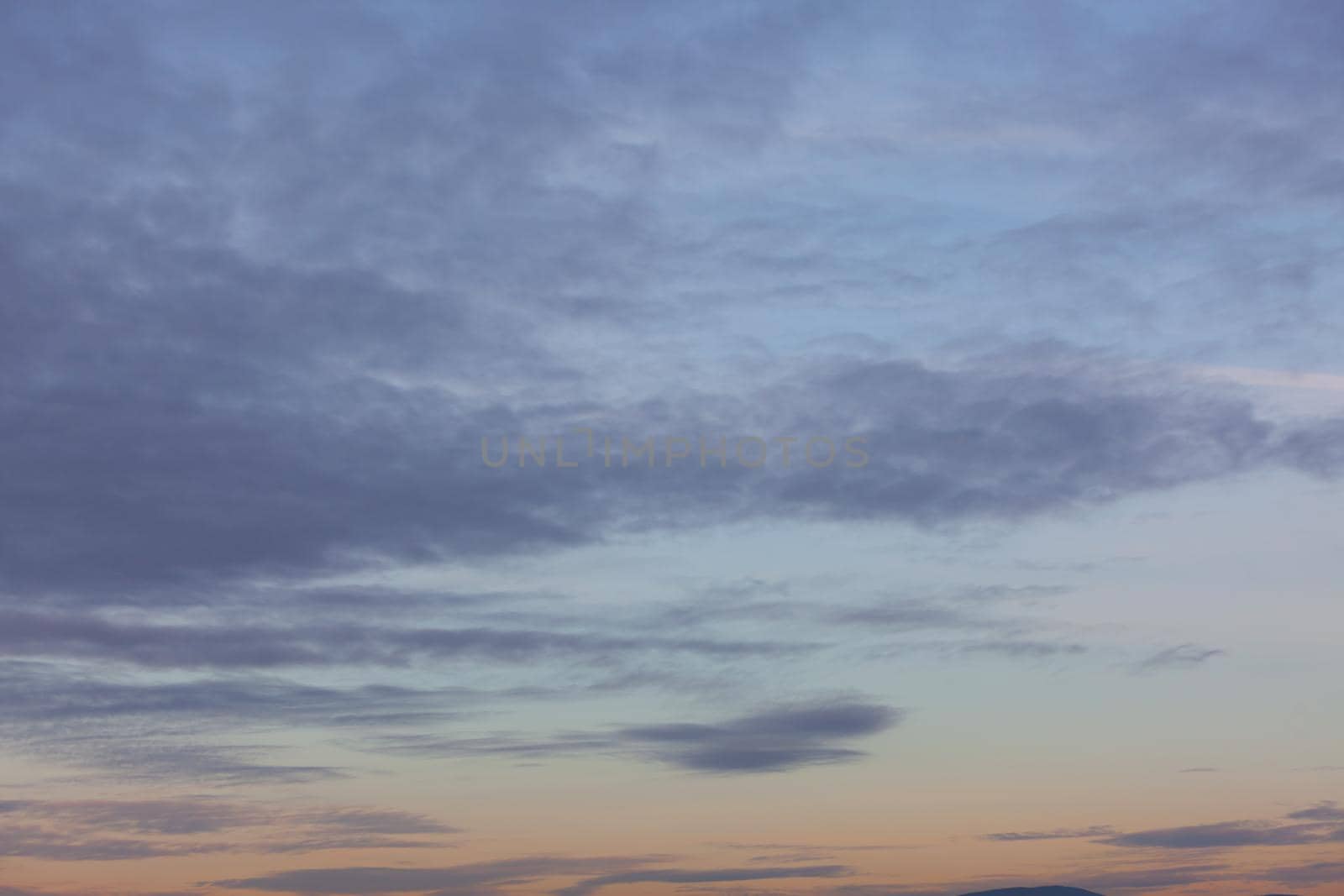 Evening sky with clouds and moon
