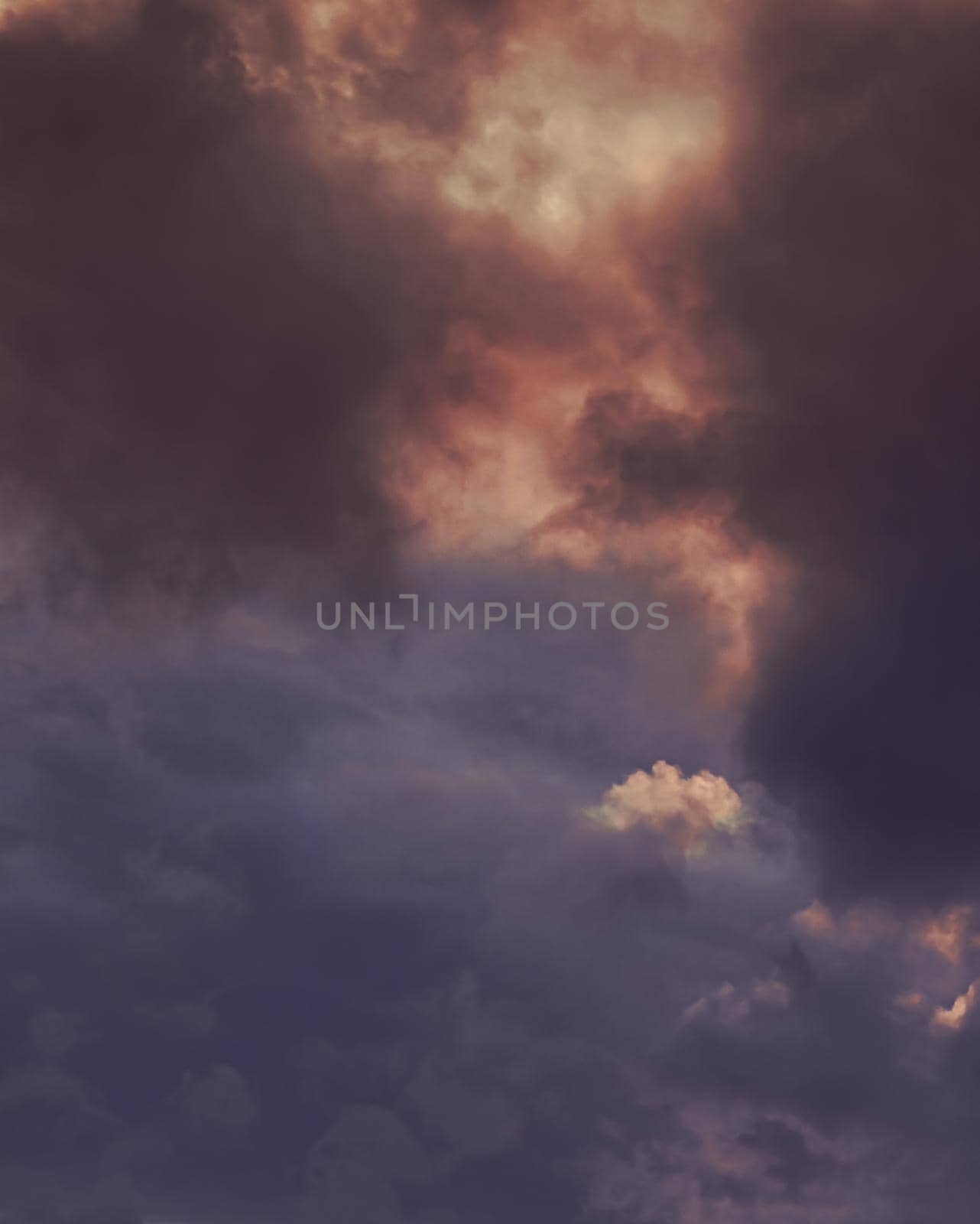 Abstract nature background. Colorful dramatic sky with cloud at sunset. Dramatic and moody pink, purple and blue cloudy sunset sky