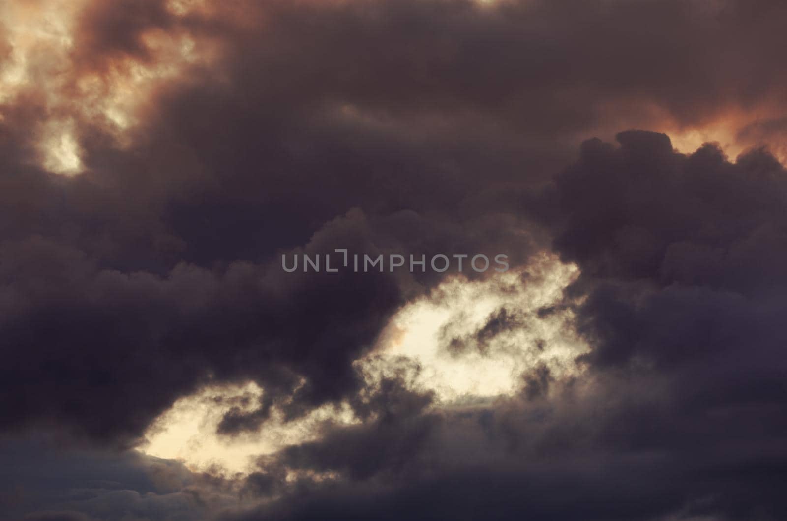 Abstract nature background. Colorful dramatic sky with cloud at sunset. Dramatic and moody pink, purple and blue cloudy sunset sky