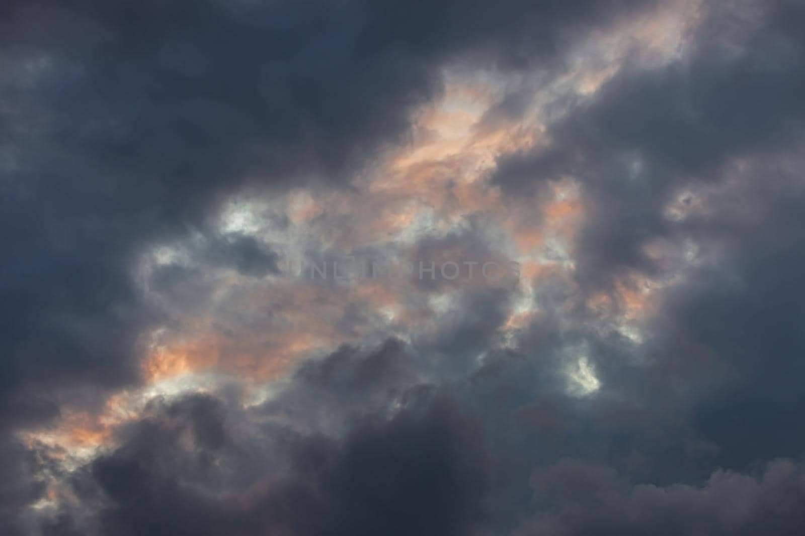 Abstract nature background. Colorful dramatic sky with cloud at sunset. Dramatic and moody pink, purple and blue cloudy sunset sky
