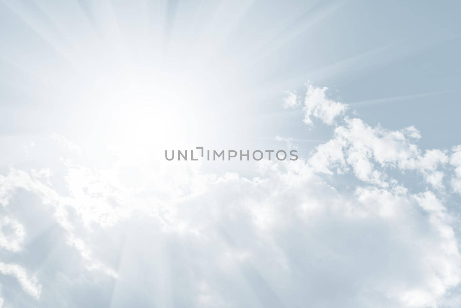Natural sky background with clouds in light tonality. Abstract nature image for background use.