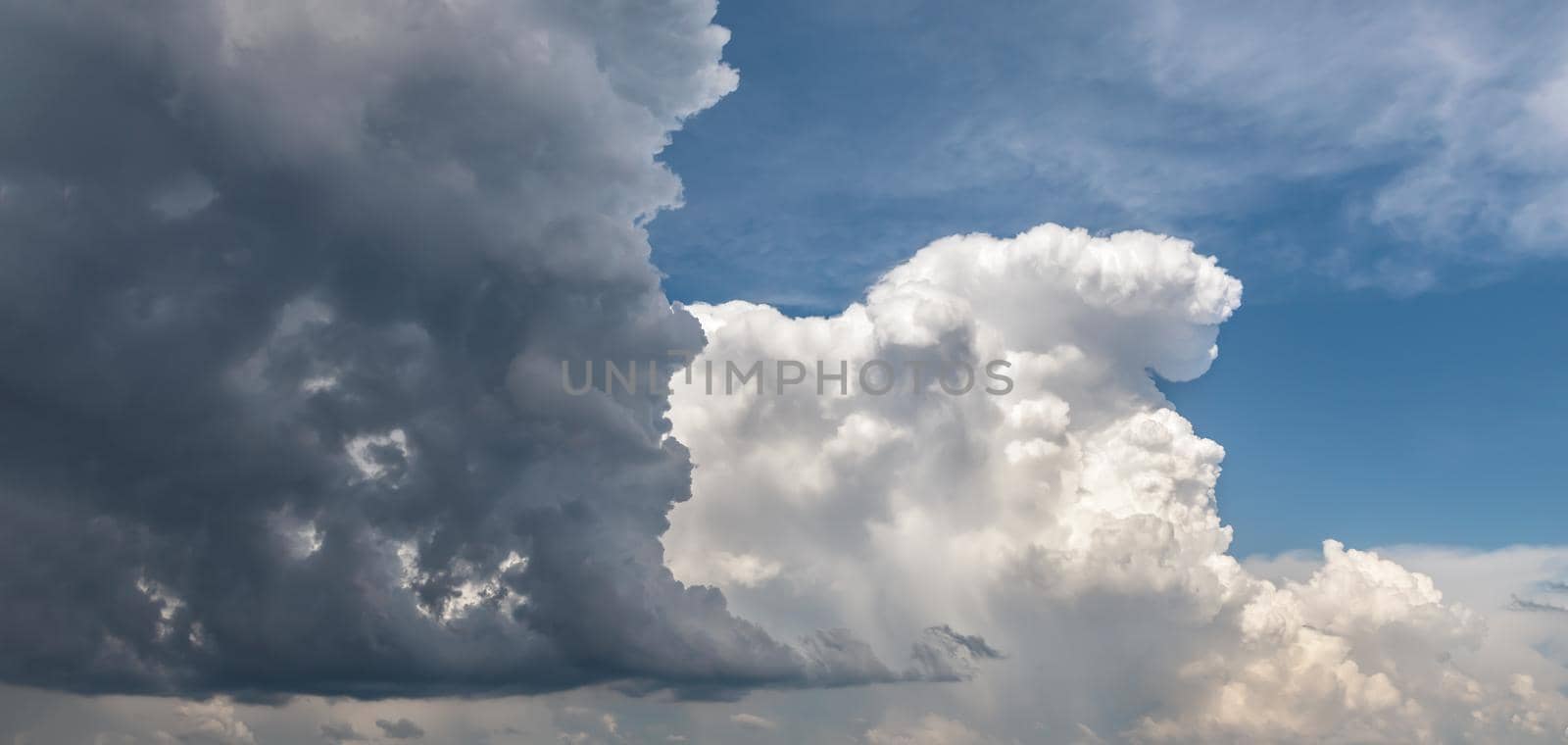 cumulonimbus cloud in the blue sky by palinchak