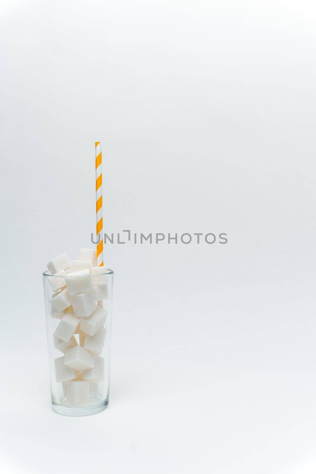 sugar in a glass with a straw cocktail sweets energy. High quality photo