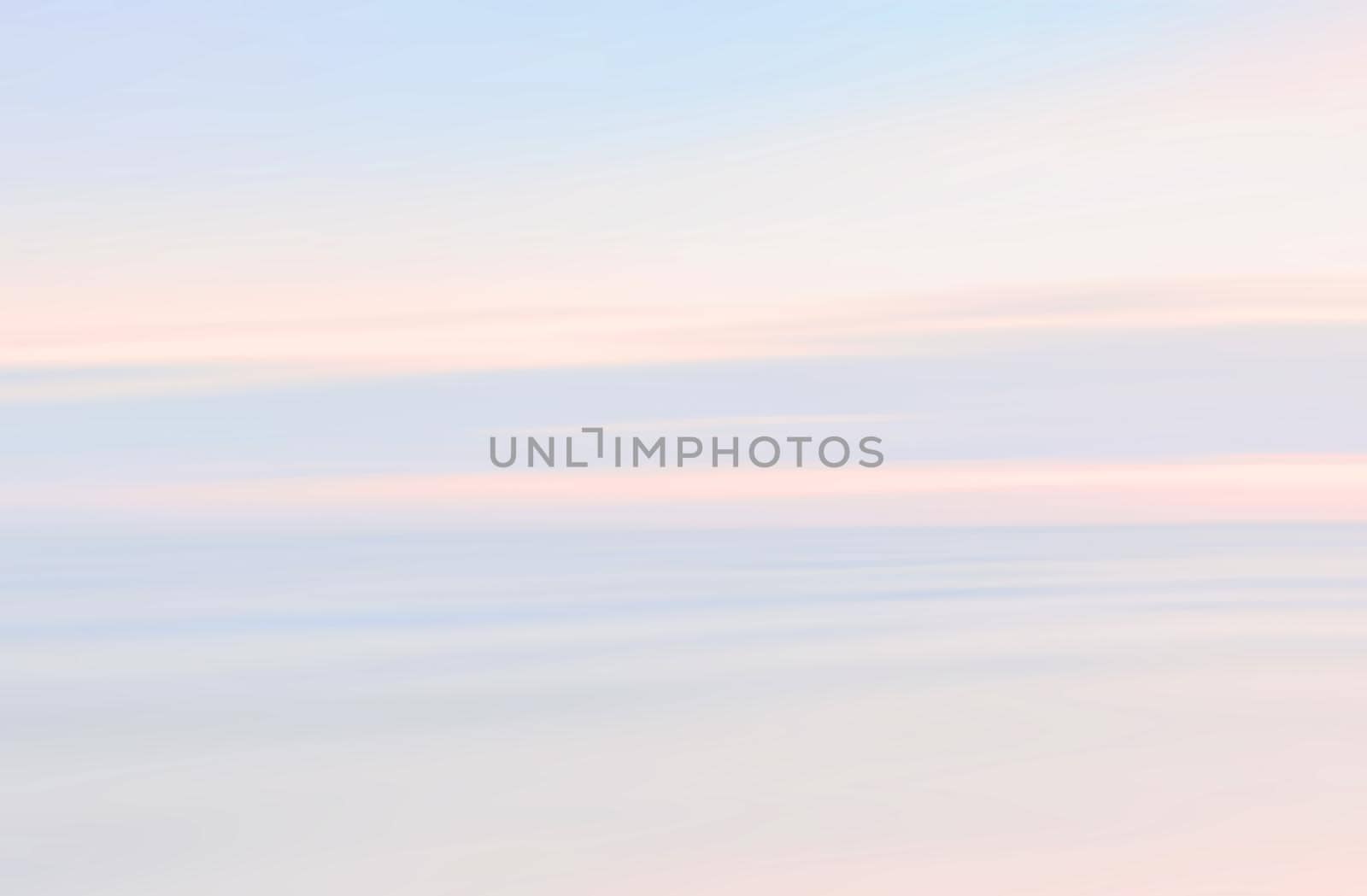 Abstract blurred sea landscape and cloudy sky background in light tonality with copy space