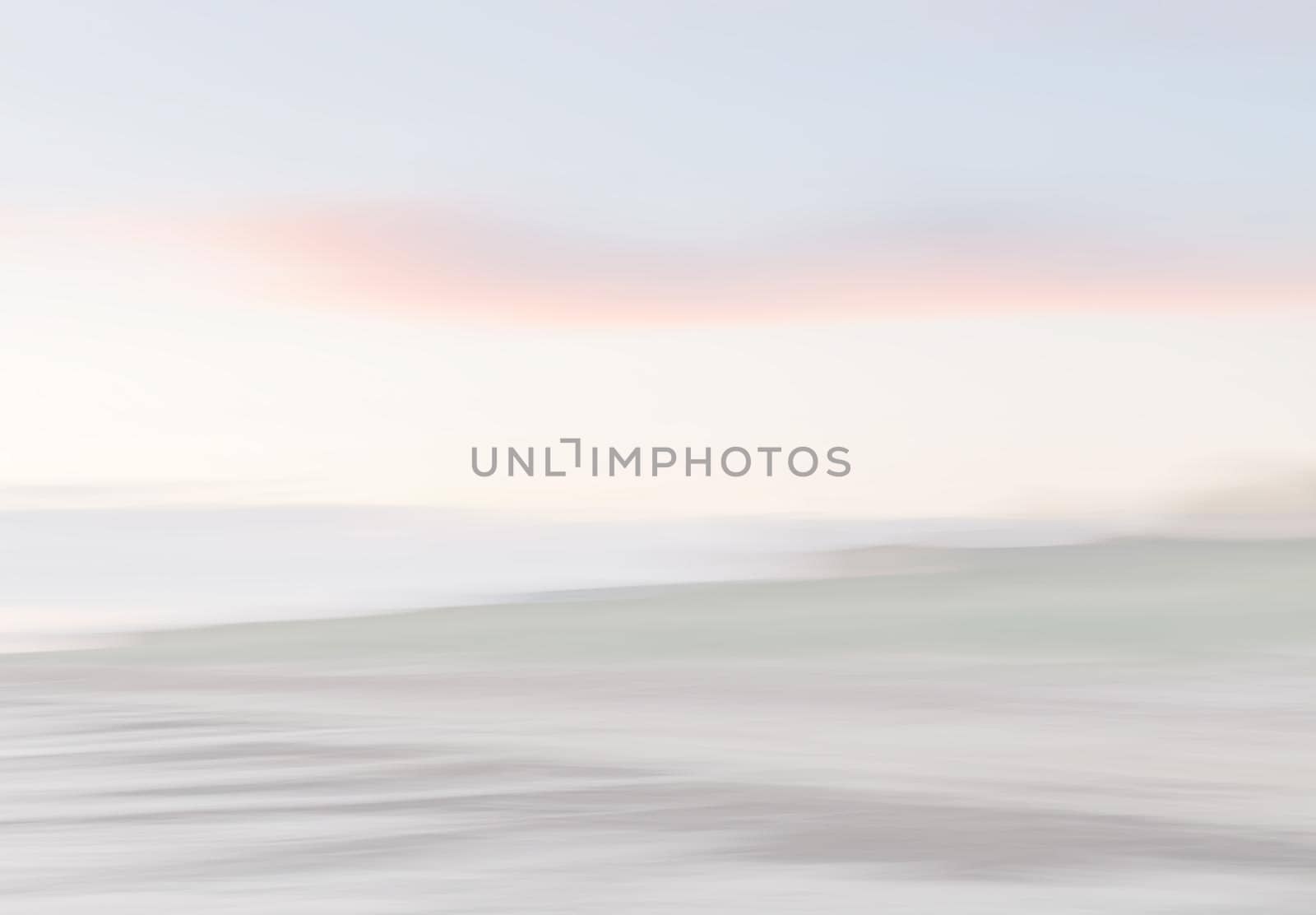 Abstract blurred sea landscape and cloudy sky background in light tonality with copy space