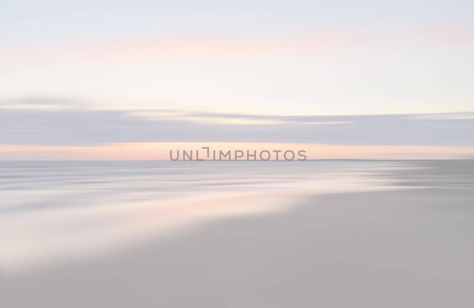 Abstract blurred sea landscape and cloudy sky background in light tonality with copy space