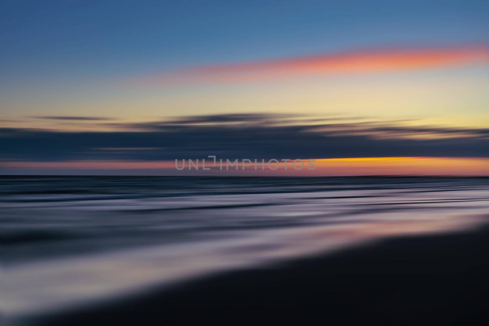 Abstract blurred sea landscape and cloudy sky background