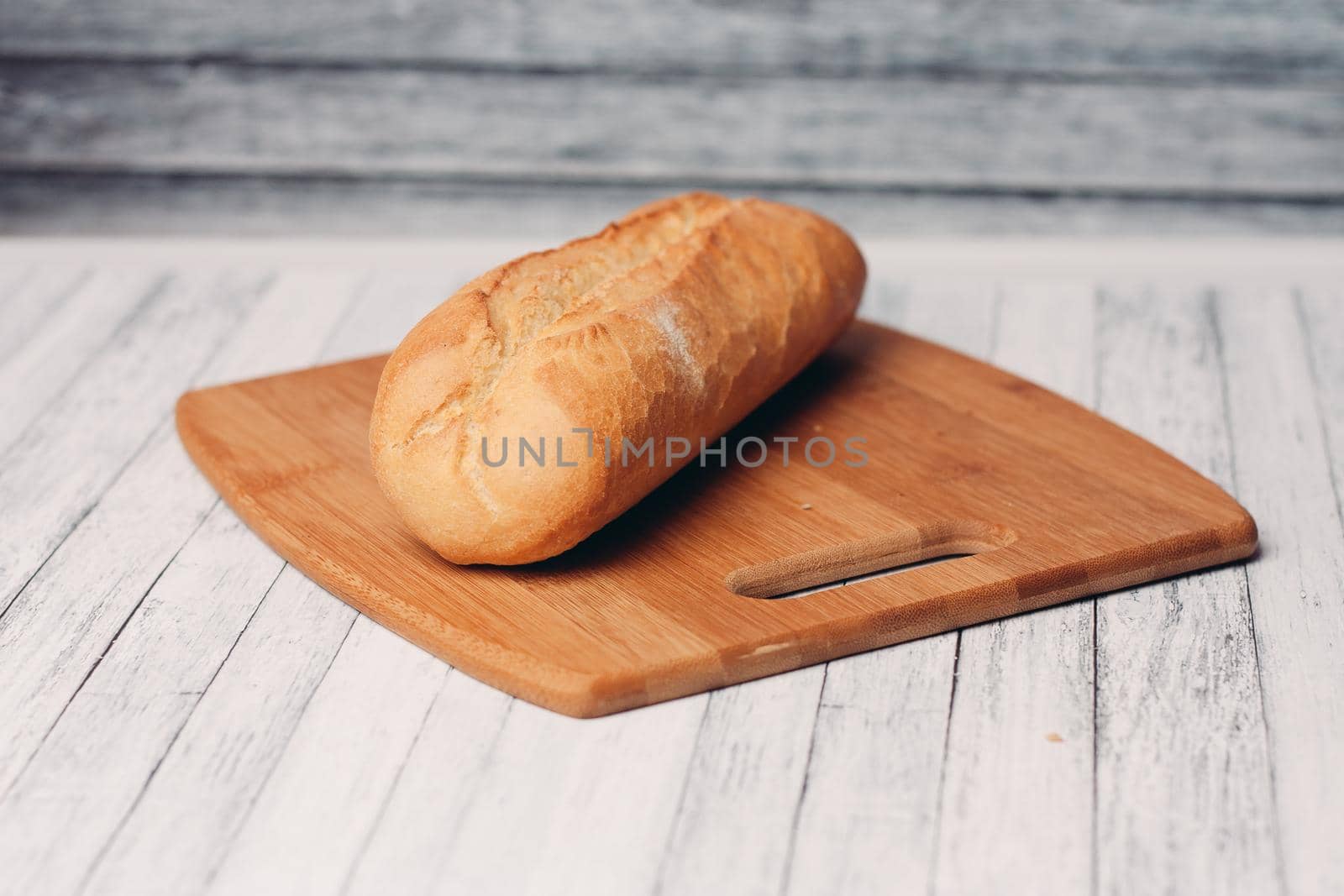 whole grain bread on wooden planks homemade pastries fresh aroma breakfast meal. High quality photo