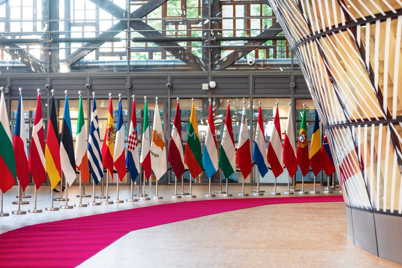 BRUSSELS, BELGIUM - May 13, 2019: Flags on the meeting of EU leaders at the EU headquarters. High Level Conference for Eastern Community Leaders in Brussels