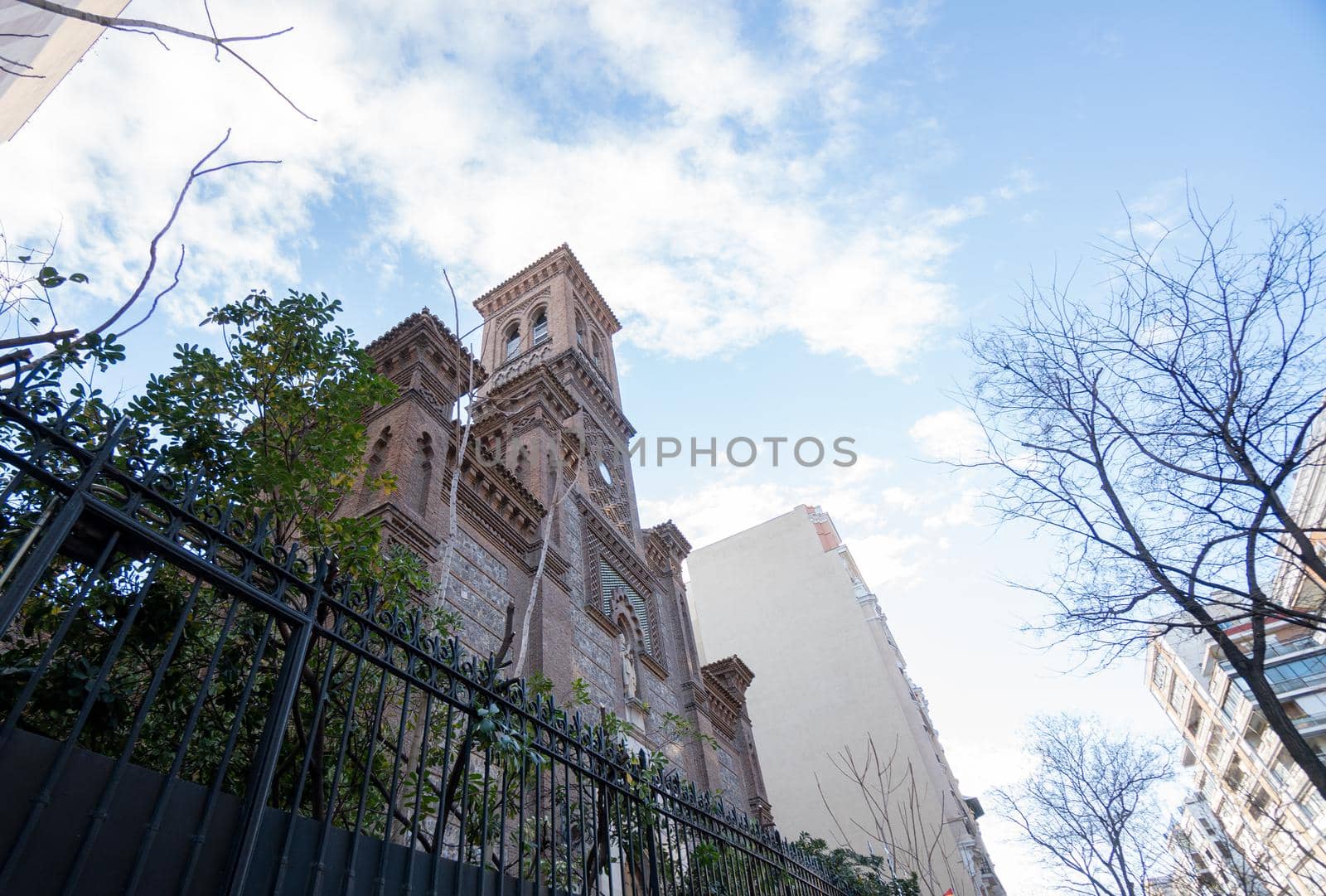 Old church of madrid with blue sky