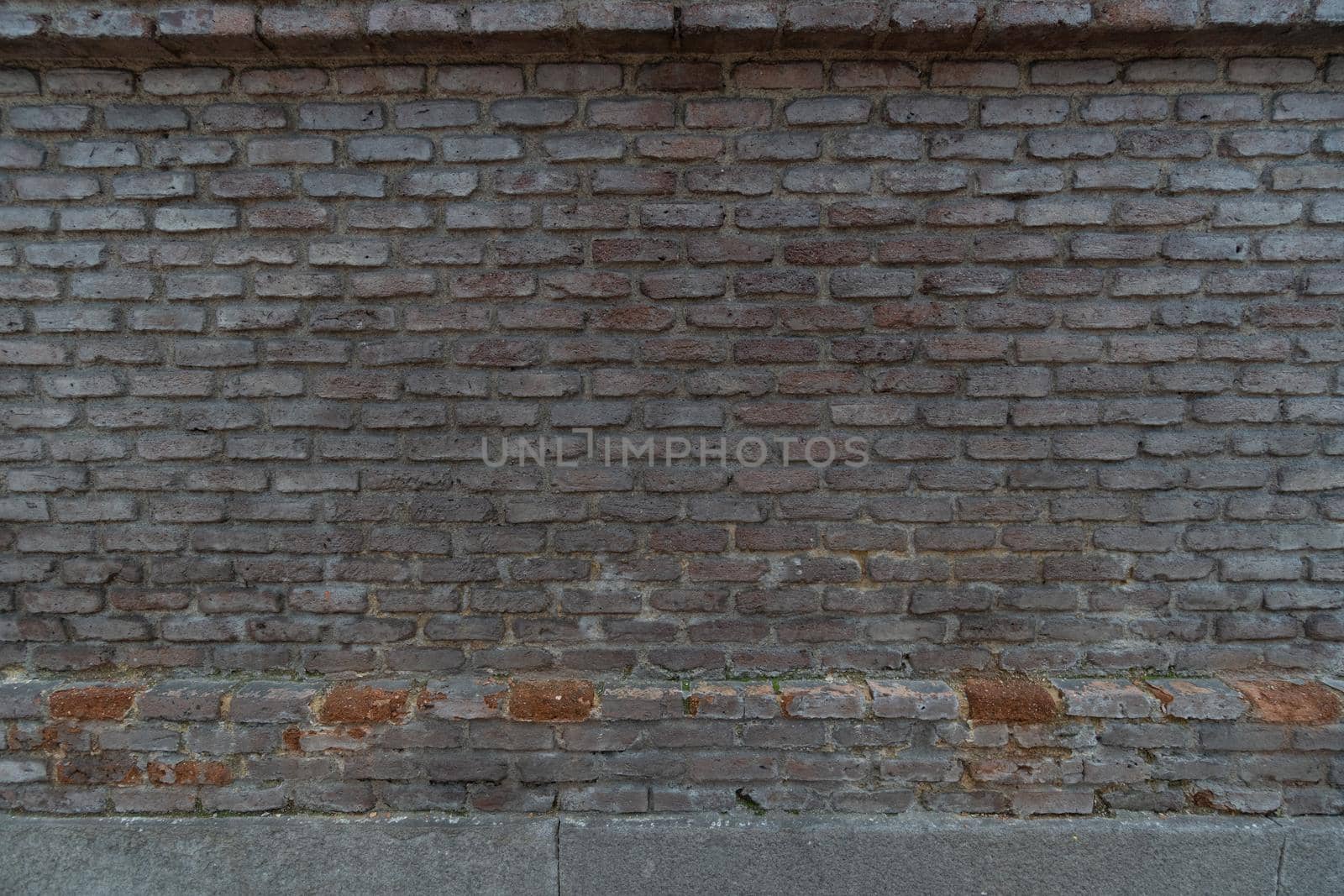 Gray brick wall found by the city by xavier_photo
