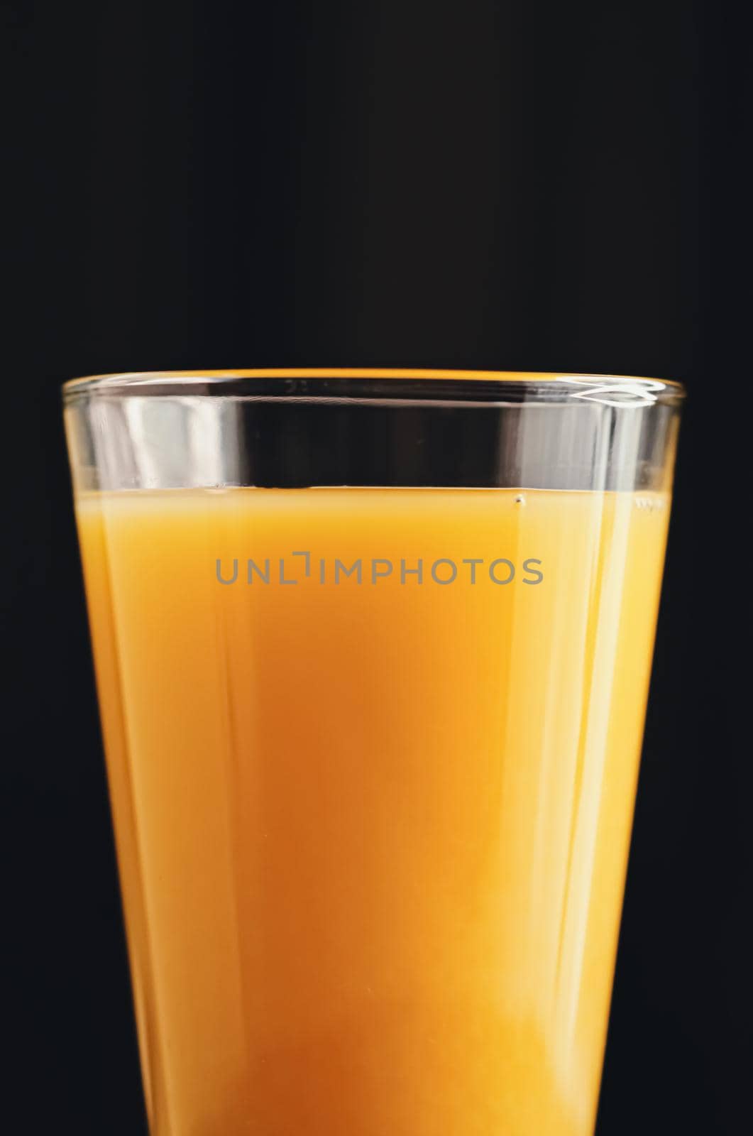 Glass of orange juice, healthy drink closeup