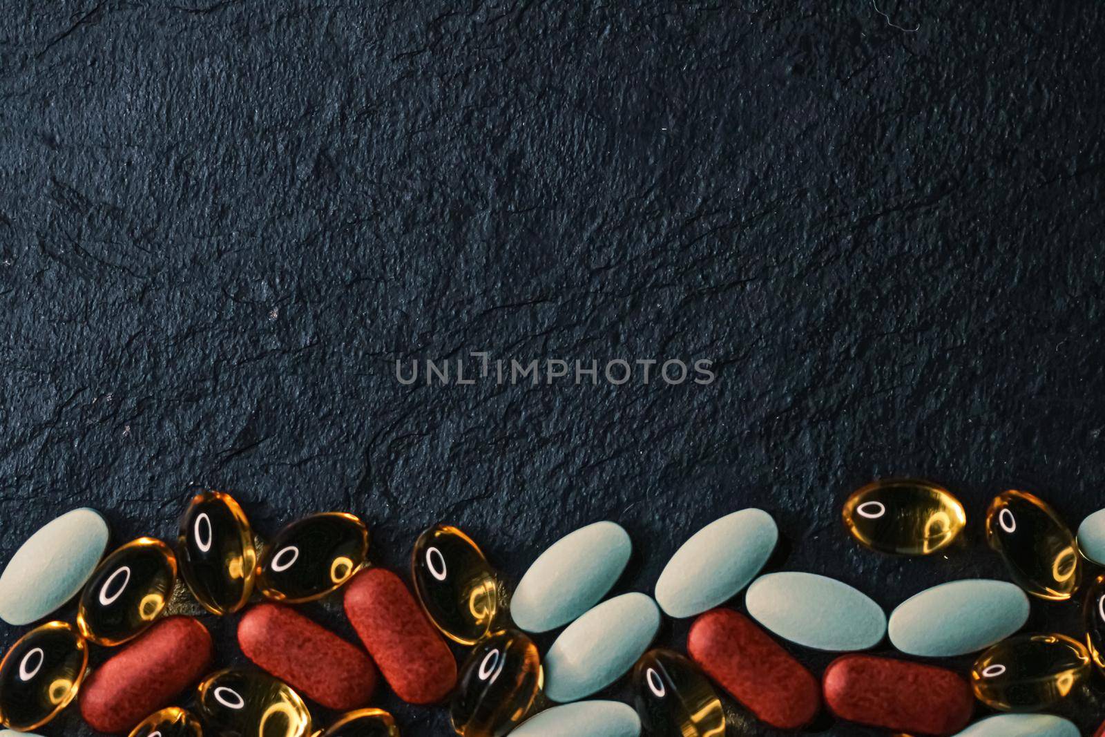 Frame made of medical pills as flatlay background, health and wellness closeup