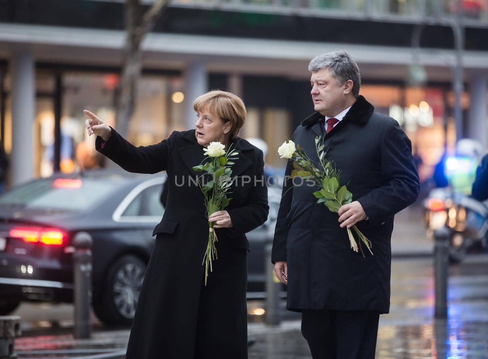 BERLIN, GERMANY - Jan 30, 2017: President of Ukraine Petro Poroshenko and German Chancellor Angela Merkel visited the place of tragedy, which occurred in the center of western Berlin December 19, 2016