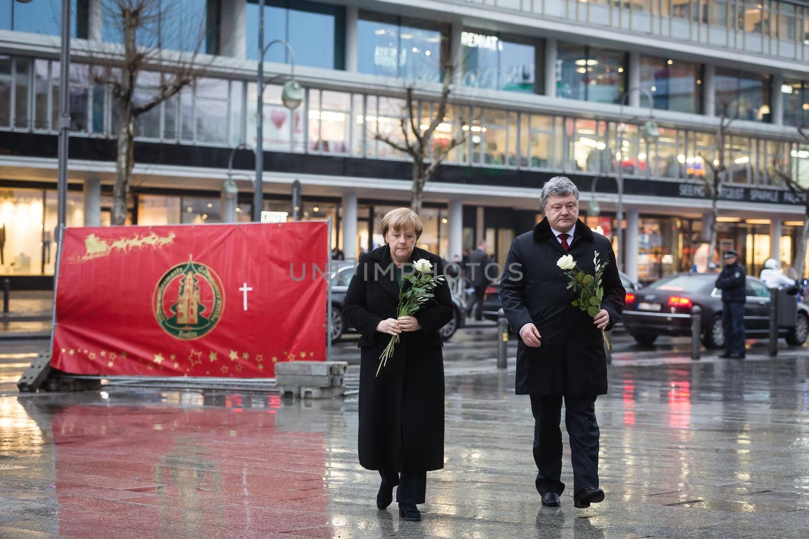 BERLIN, GERMANY - Jan 30, 2017: President of Ukraine Petro Poroshenko and German Chancellor Angela Merkel visited the place of tragedy, which occurred in the center of western Berlin December 19, 2016