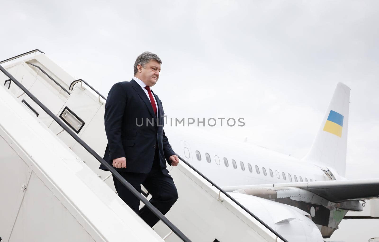 BERLIN, GERMANY - Jan 30, 2017: President of Ukraine Petro Poroshenko down the gangway of the plane during an official visit to Germany