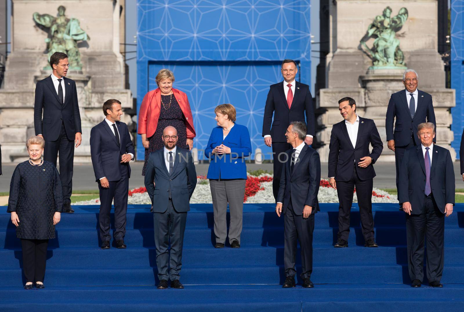 BRUSSELS, BELGIUM - Jul 11, 2018: Jens Stoltenberg, Donald Trump,  Emmanuel Macron and Angela Merkel at the group photo of participants of the NATO military alliance summit
