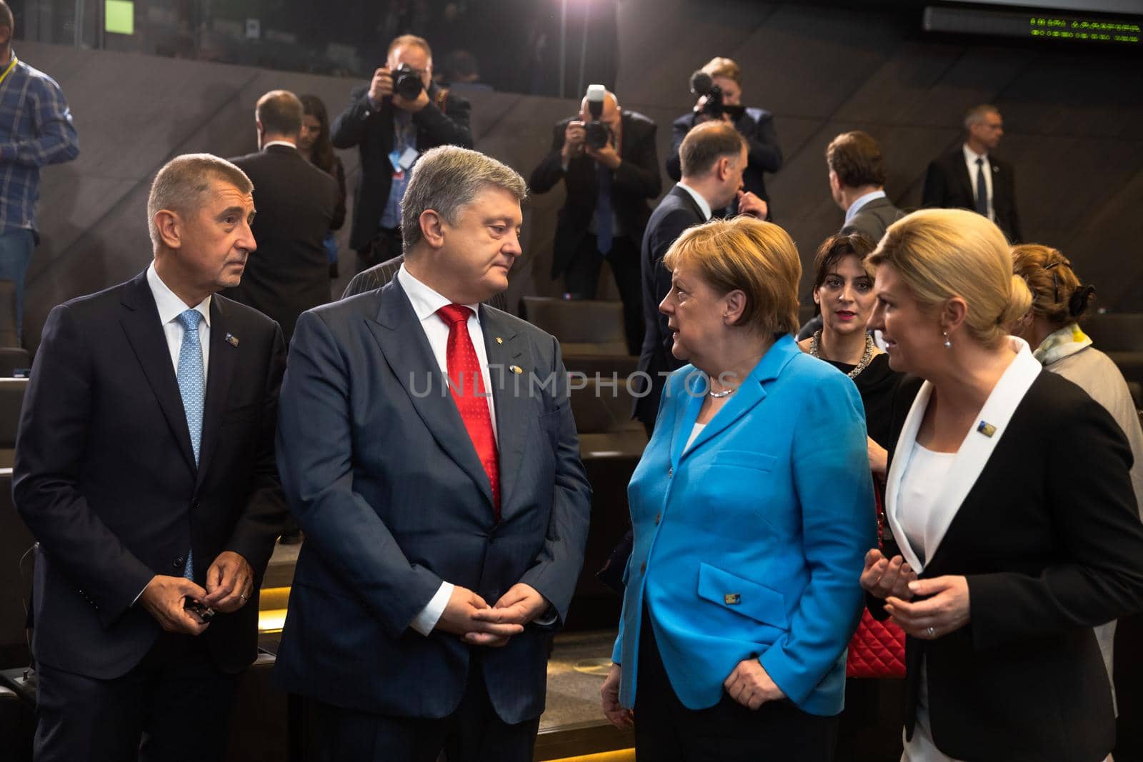 BRUSSELS, BELGIUM - Jul 12, 2018: Ukrainian President Petro Poroshenko and German Chancellor Angela Merkel during NATO military alliance summit in Brussels