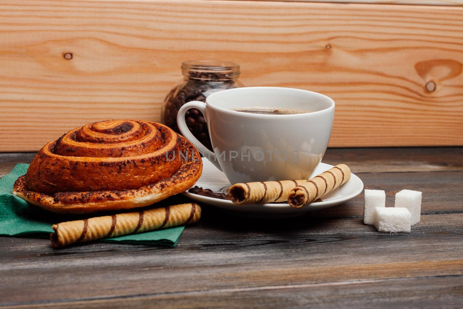 sweet bun dessert for breakfast coffee cup cinnabon. High quality photo