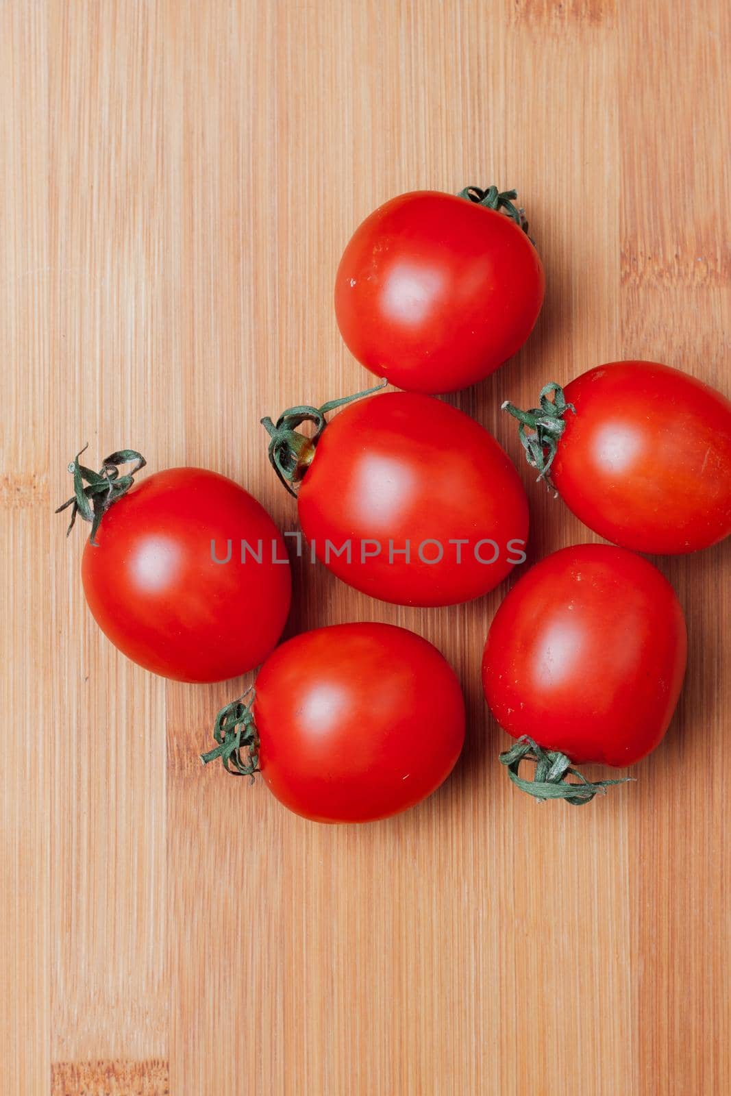italian pasta cherry tomatoes cutting board food preparation kitchen ingredients by SHOTPRIME
