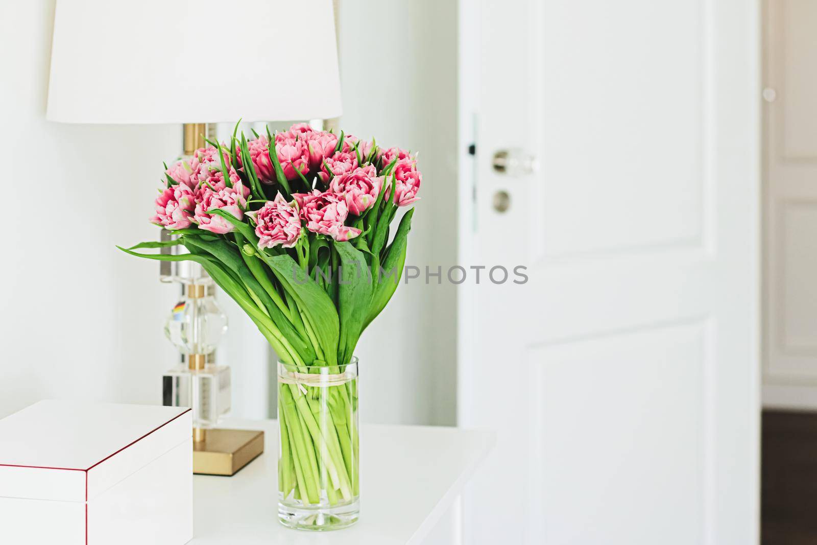 Bouquet of flowers in vase and home decor details, luxury interior design by Anneleven