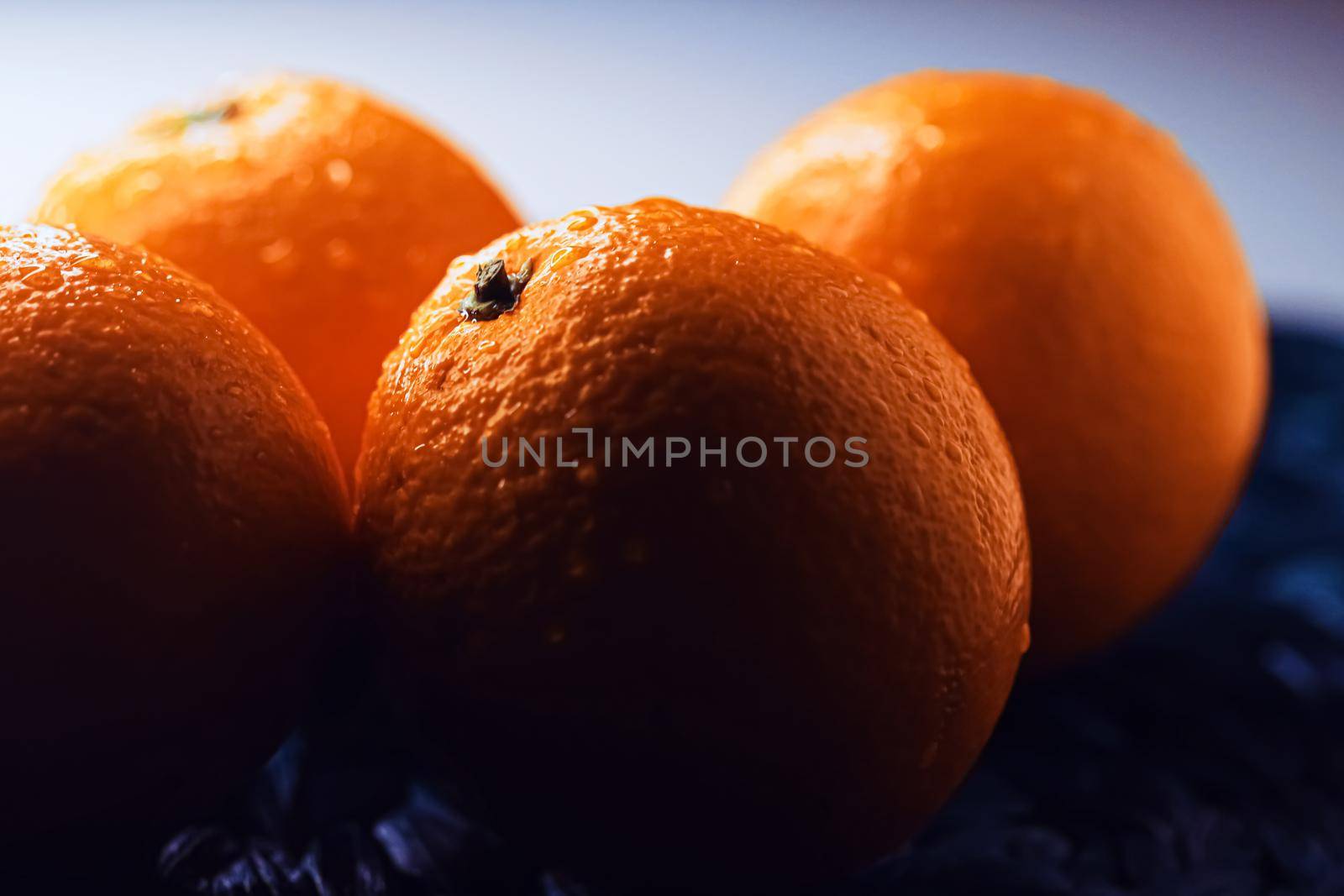 Organic oranges fresh from the garden, healthy food and fruits closeup