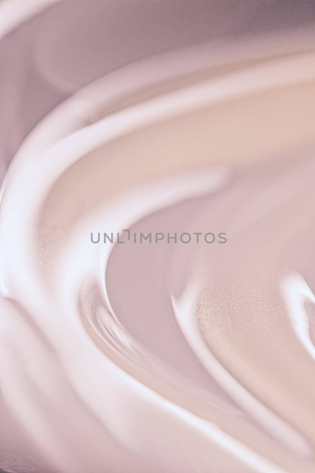 Glowing cosmetic emulsion, rose gold cream or lotion as beauty and skincare background closeup