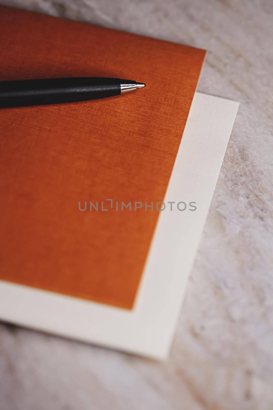 Pen and papers as office stationery, closeup