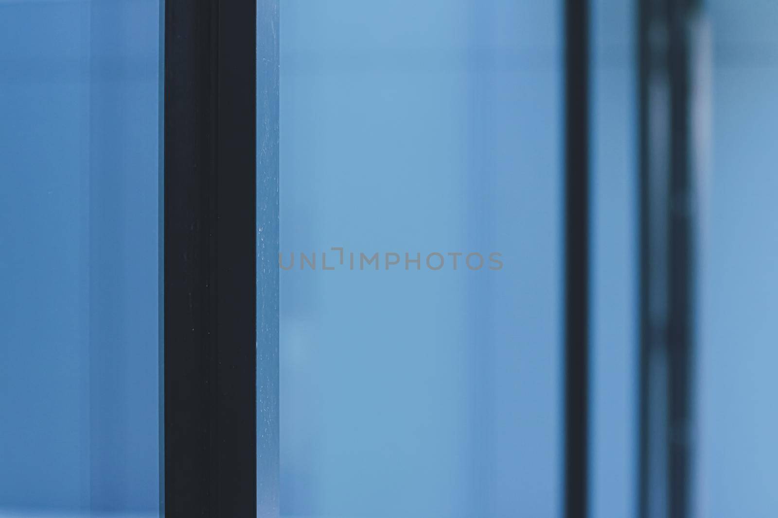 Glass walls as abstract urban background, exterior design and architectural detail closeup