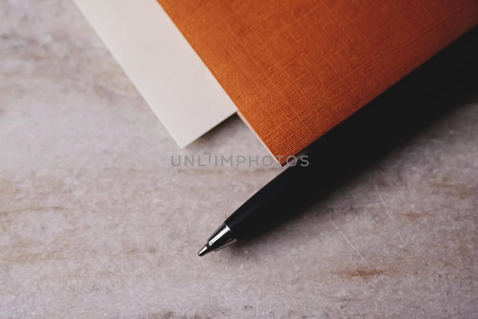 Pen and papers as office stationery, closeup