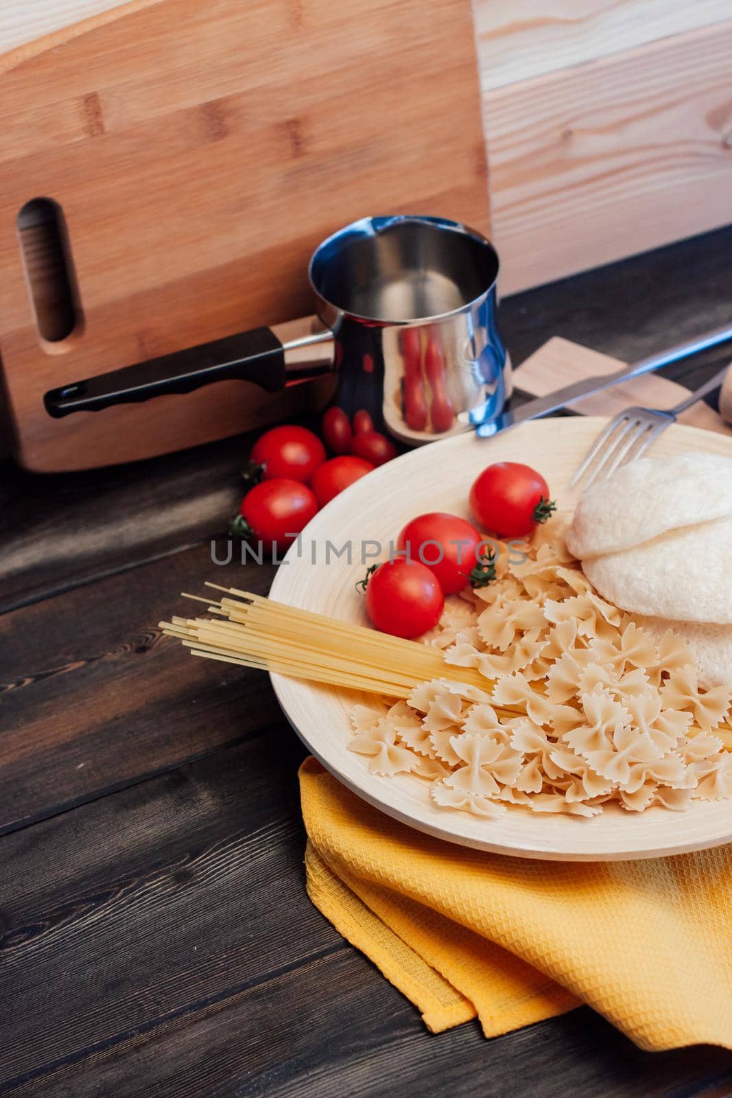 italian pasta cooking cherry tomatoes cuisine lunch. High quality photo