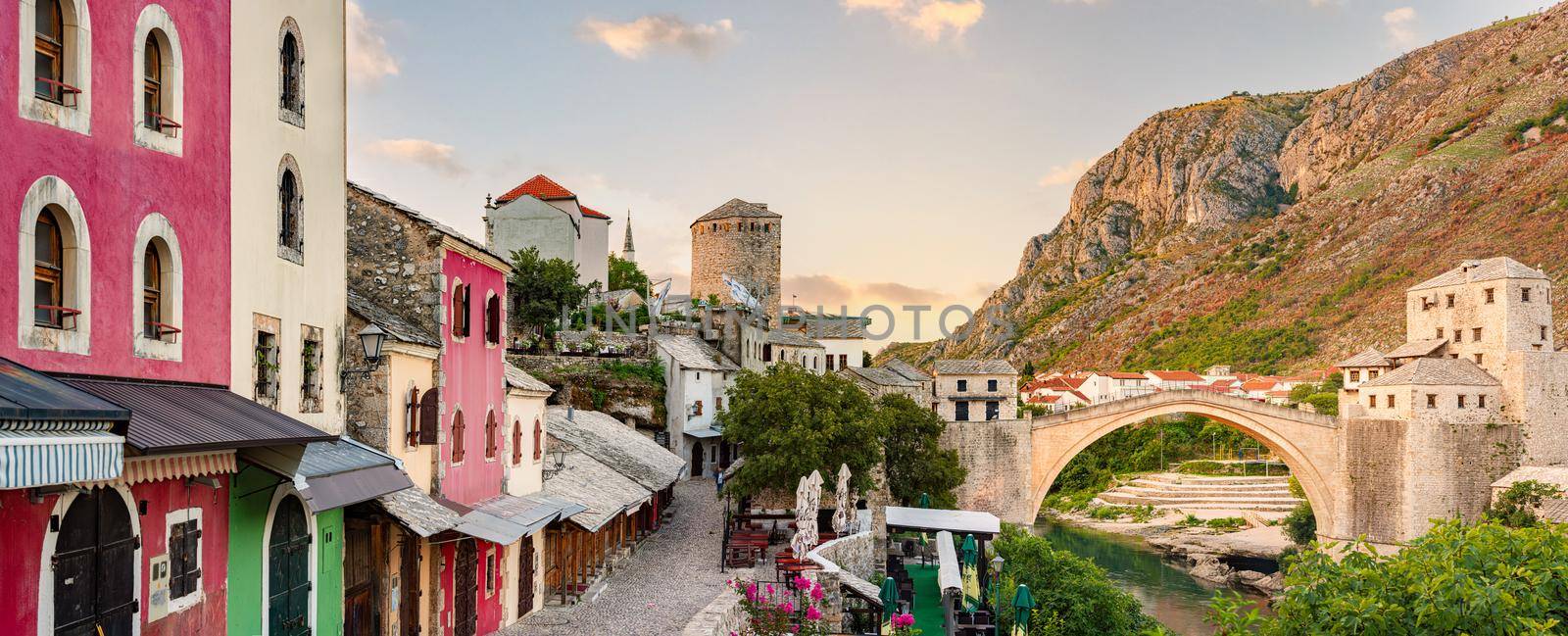 Mostar city street, Bosnia and Herzegovina. The Old Bridge, at sunrise. Travel in Europe.