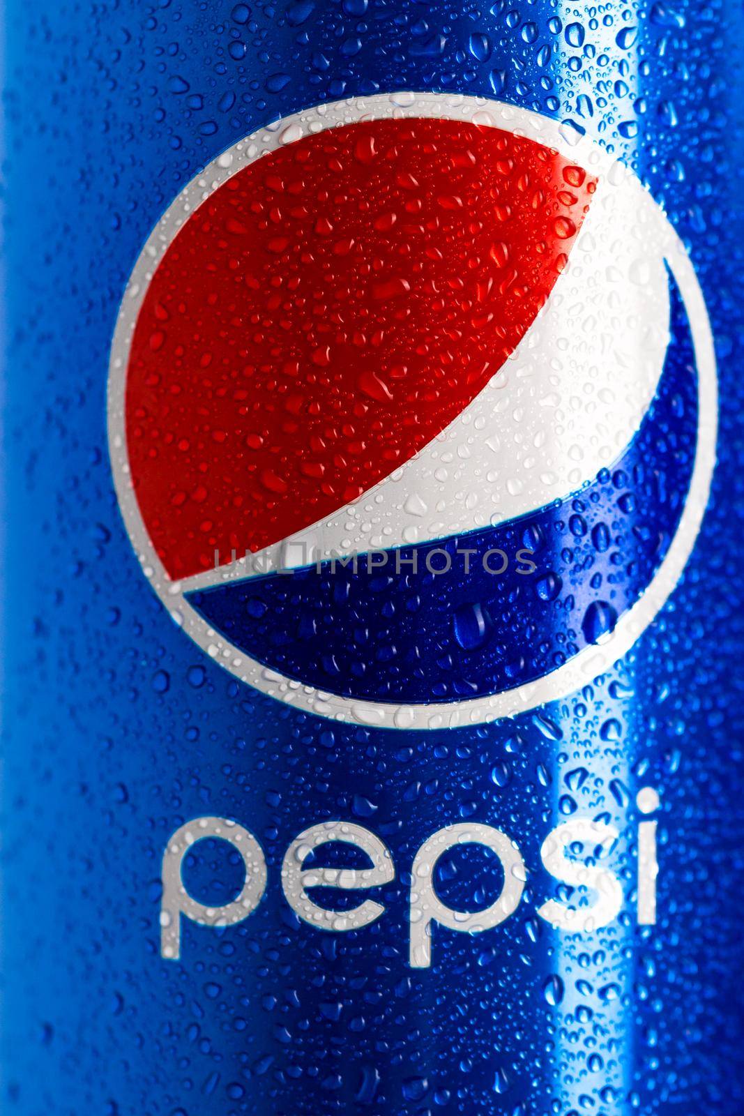 Detail of classic Pepsi can with water droplets on black background. Studio shot in Bucharest, Romania, 2021