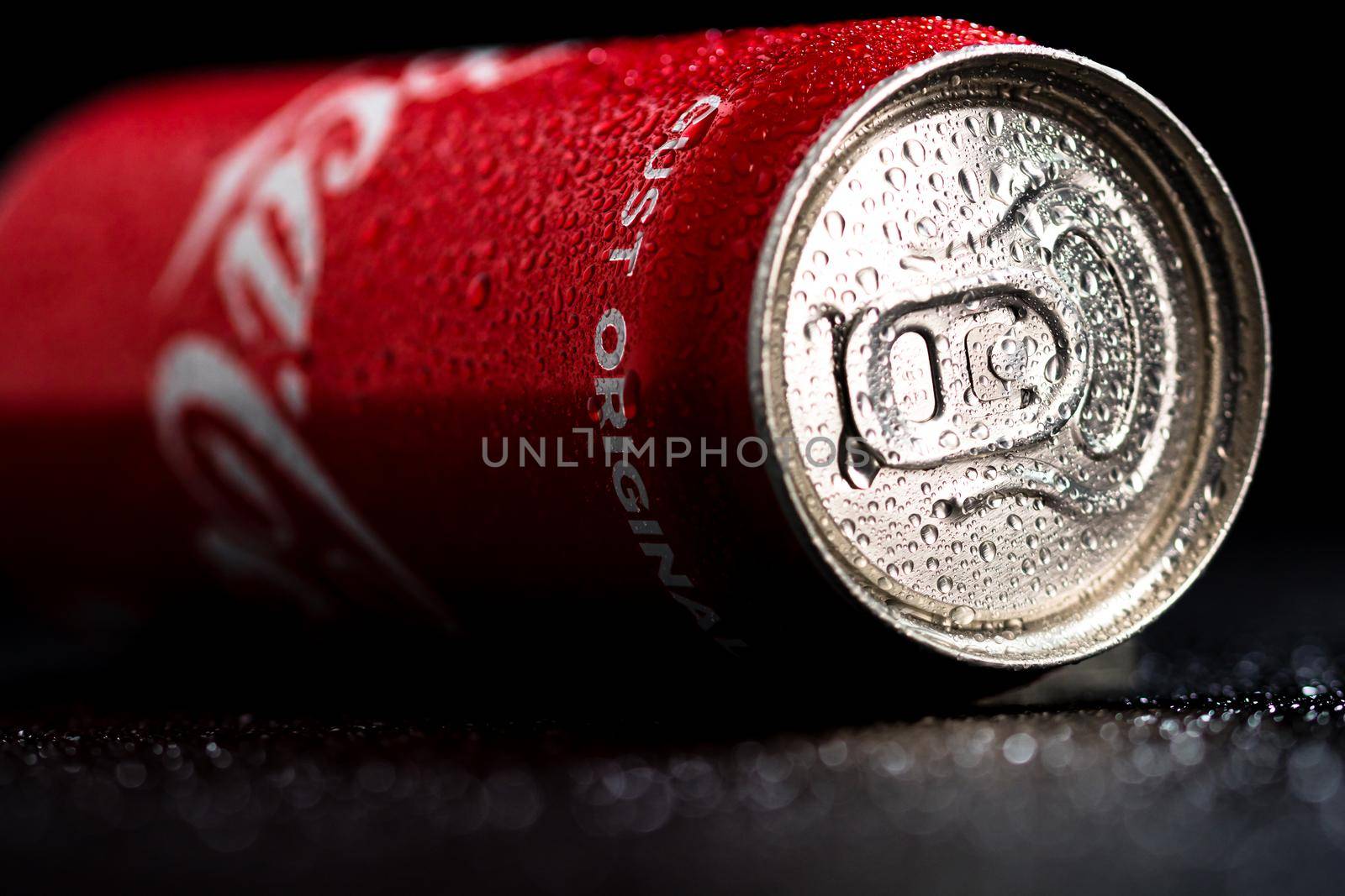 Water droplets on classic Coca-Cola can on black background. Studio shot in Bucharest, Romania, 2021