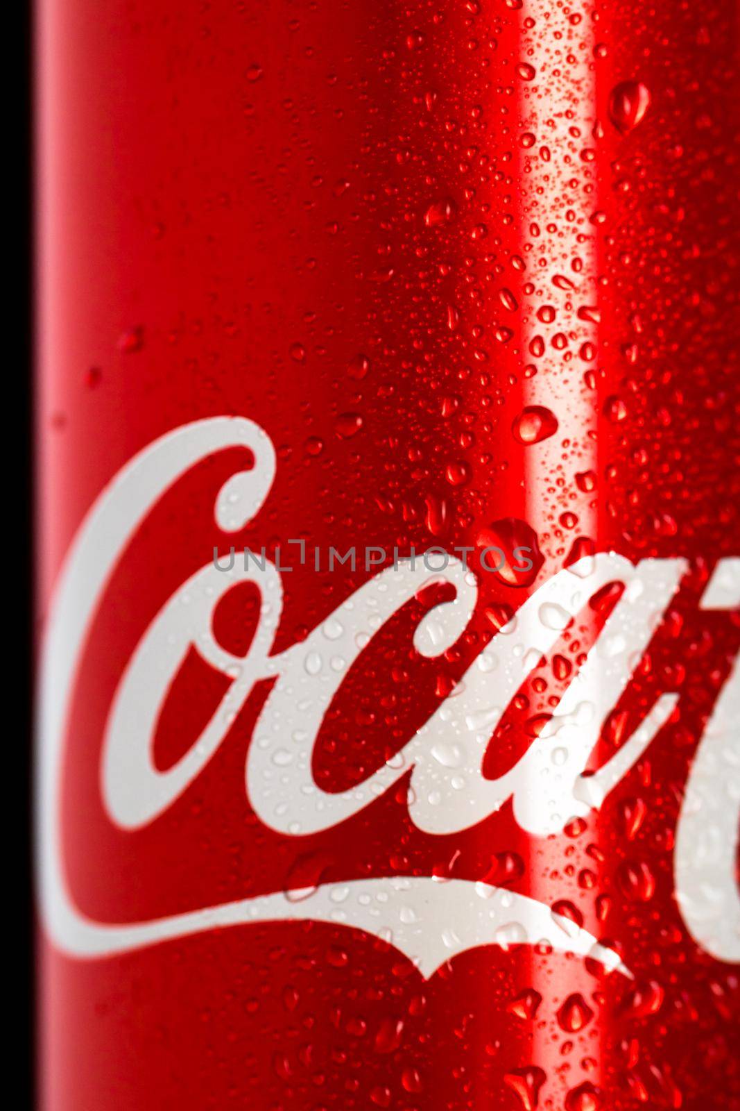 Detail of classic Coca-Cola can on black background. Studio shot in Bucharest, Romania, 2021