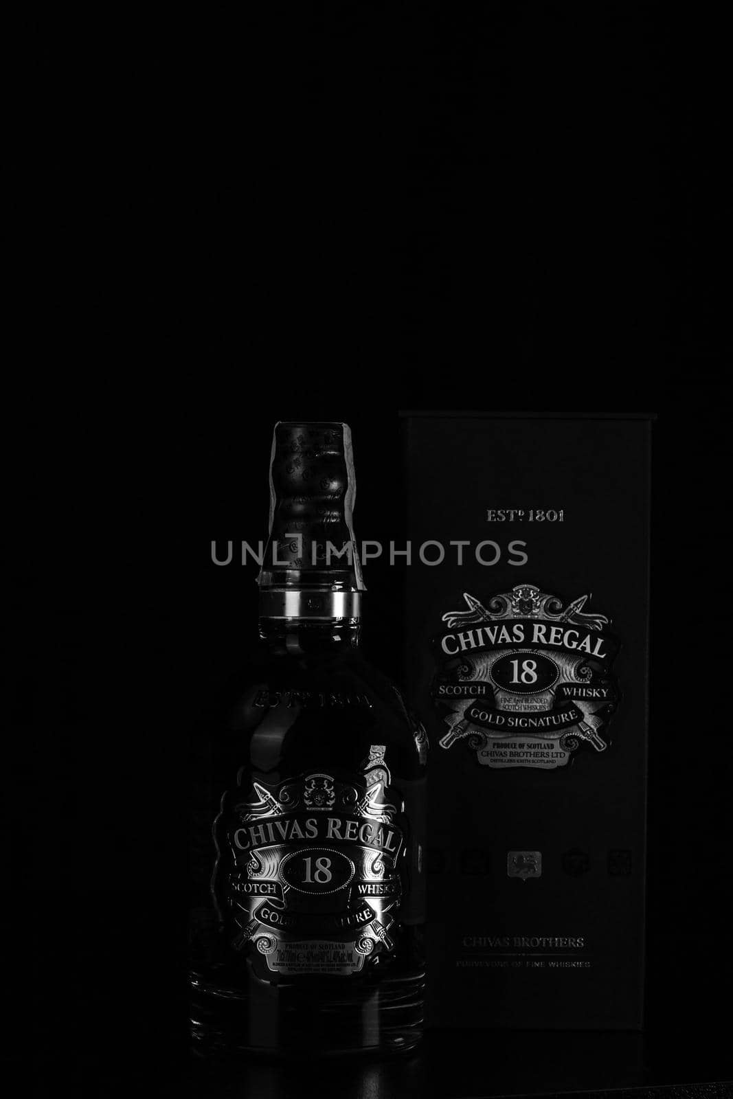 Chivas Regal 18 is blended from whiskies matured for at least 18 years. Whisky bottle on barrel. Illustrative editorial photo Bucharest, Romania, 2021