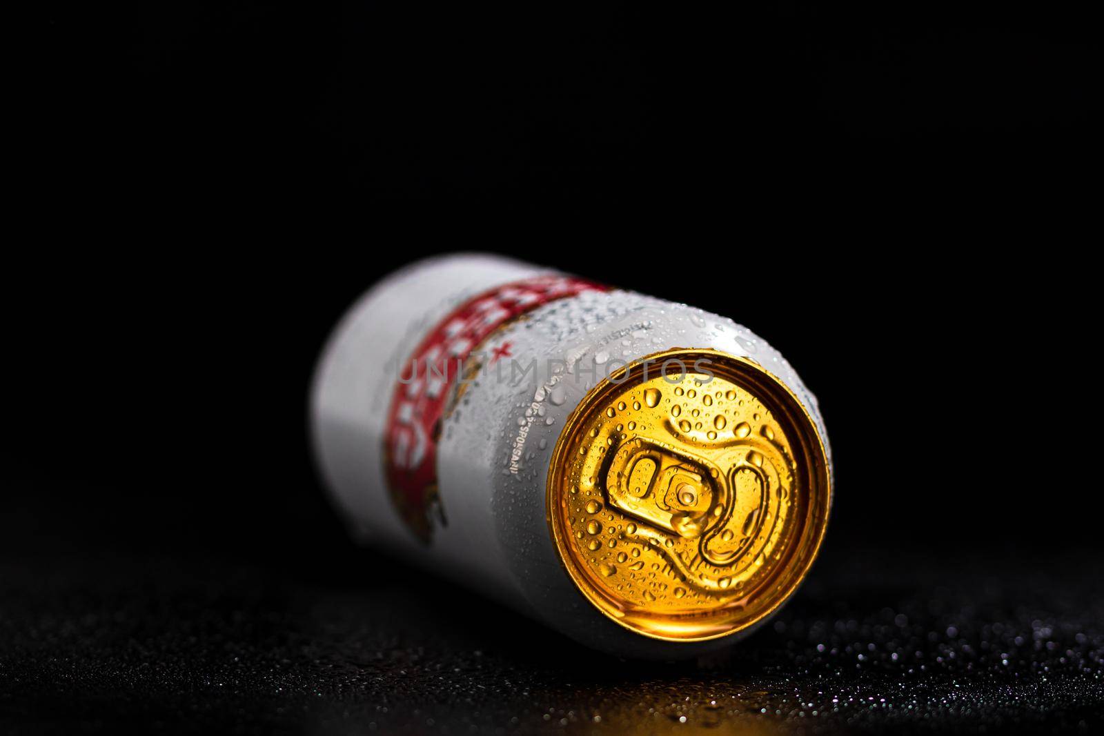 Condensation water droplets on Stella Artois beer can isolated on black. Bucharest, Romania, 2020