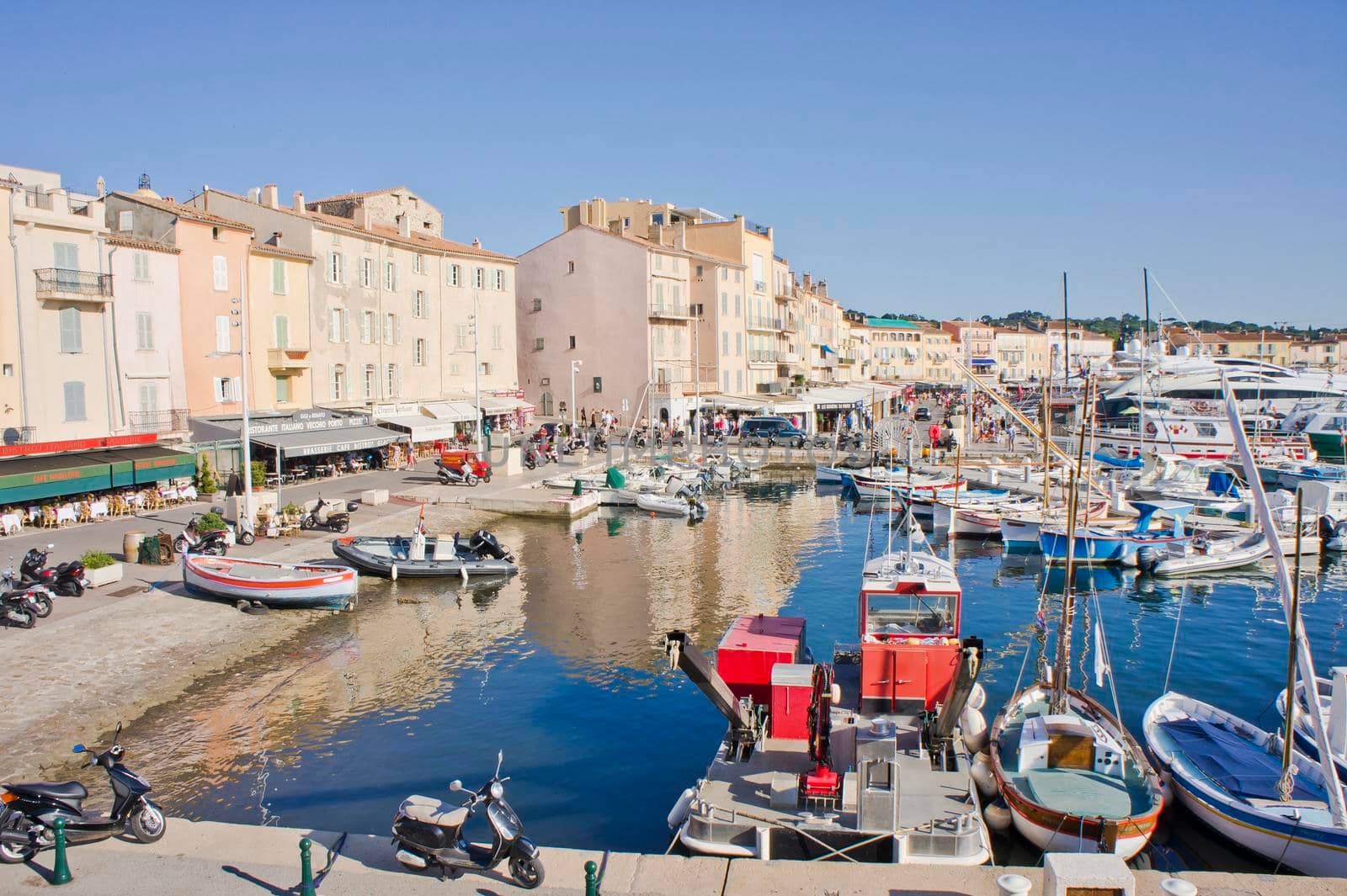 Saint Tropez, Old port view with fishing boats and colorful houses, Côte d'Azur. France, Europe