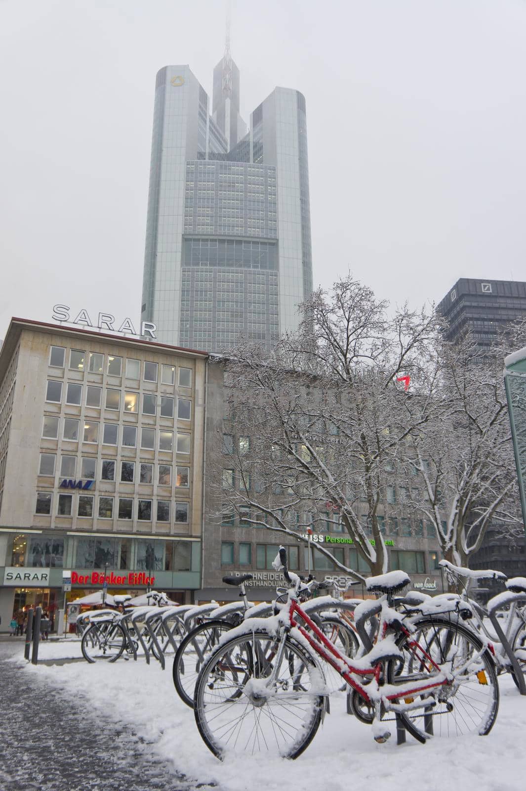 Frankfurt, Snowy day old city view, Snowy Bicycle, Germany, Europe by giannakisphoto